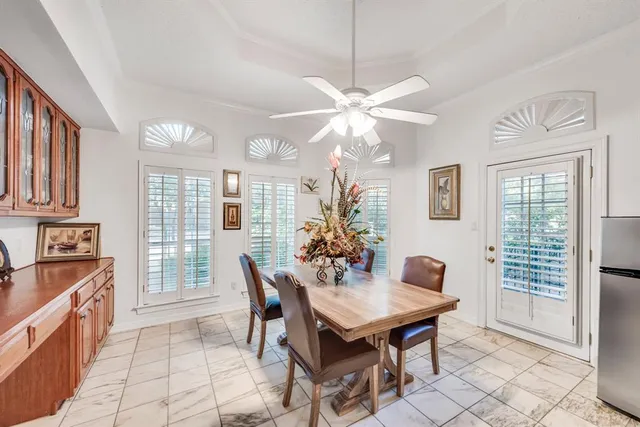 a kitchen with stainless steel appliances a sink and cabinets