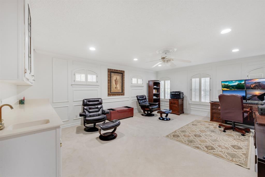 7204 Debbe Drive Dallas, TX 75252 - Photo 28 of 40 a view of a livingroom with furniture and a window