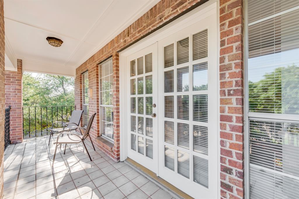 7204 Debbe Drive Dallas, TX 75252 - Photo 30 of 40 a balcony with furniture and next to a window
