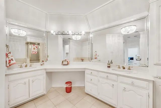 a view of a livingroom with furniture and a fan