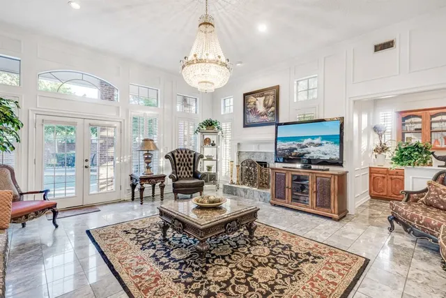 a living room with furniture and a table