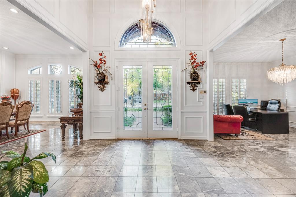 7204 Debbe Drive Dallas, TX 75252 - Photo 10 of 40 a view of livingroom with furniture and floor to ceiling window