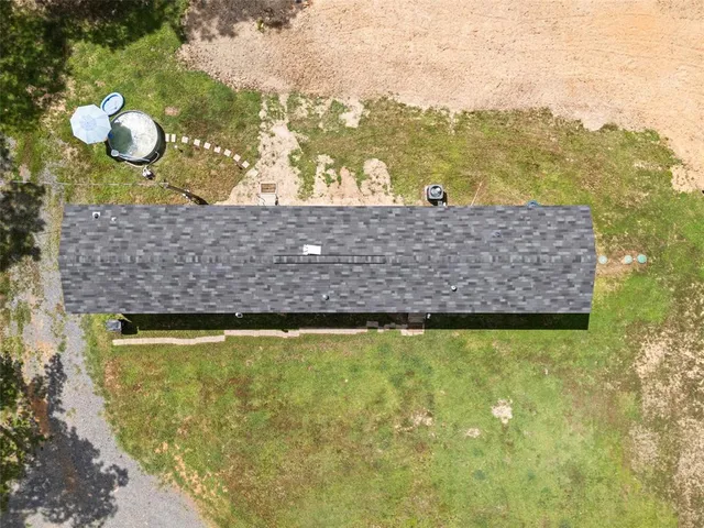 a view of a swimming pool and an outdoor space