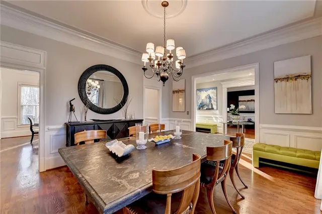 a living room with furniture window and flat screen tv