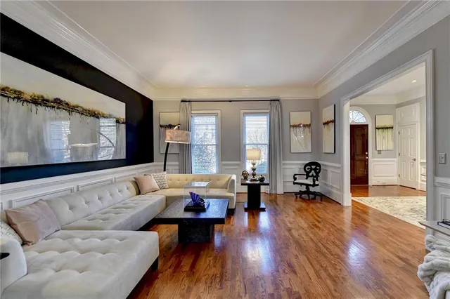 a view of walk in closet and empty room