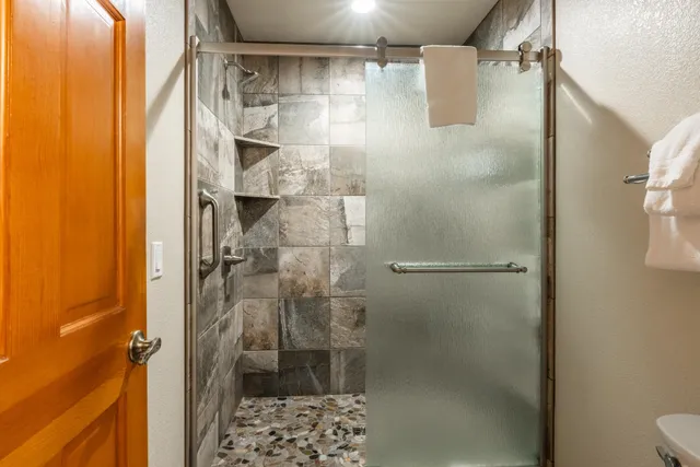 a stove top oven sitting inside of a kitchen