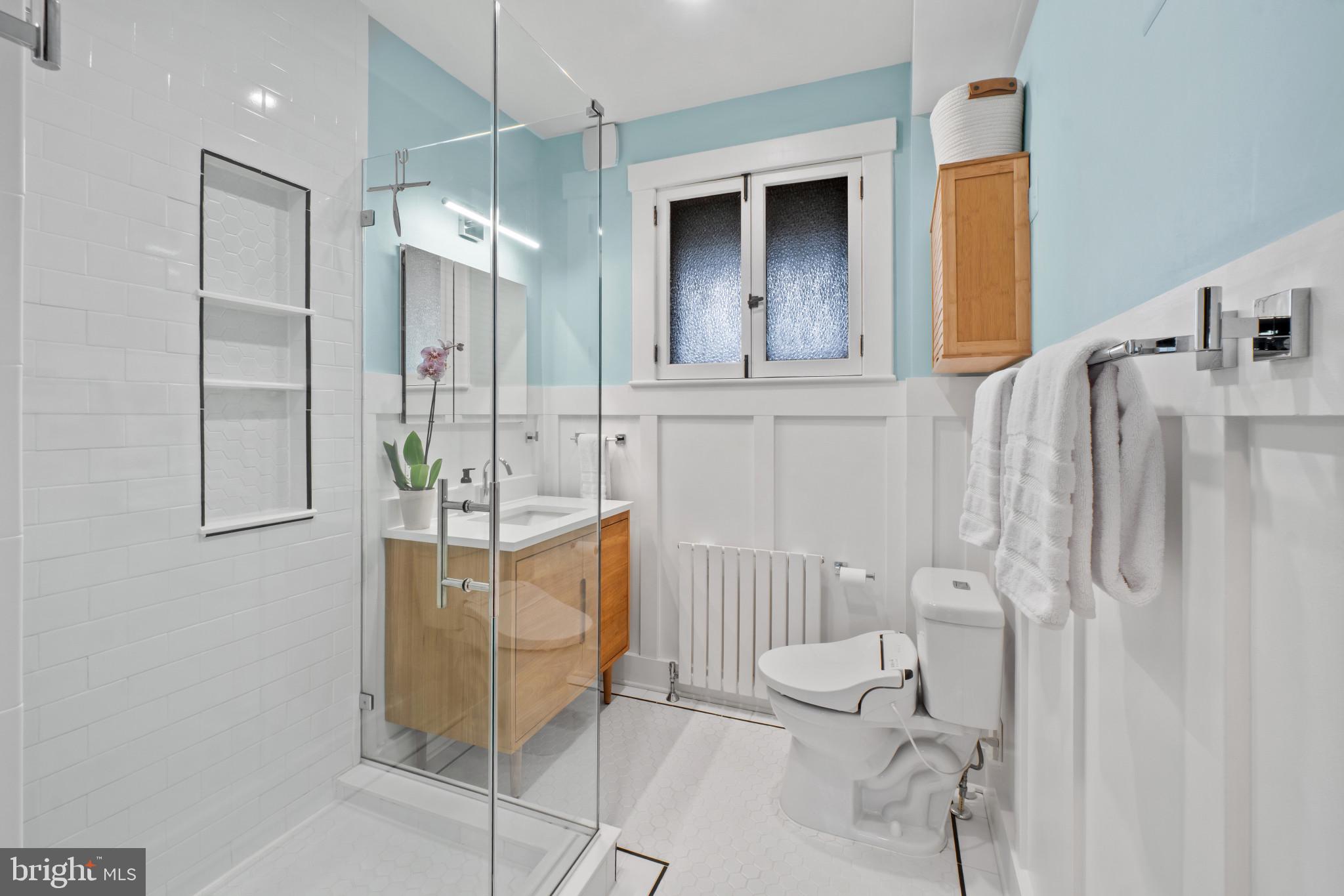 2900 Rueckert Avenue Baltimore, MD 21214 - Photo 22 of 40 a bathroom with a sink toilet and shower