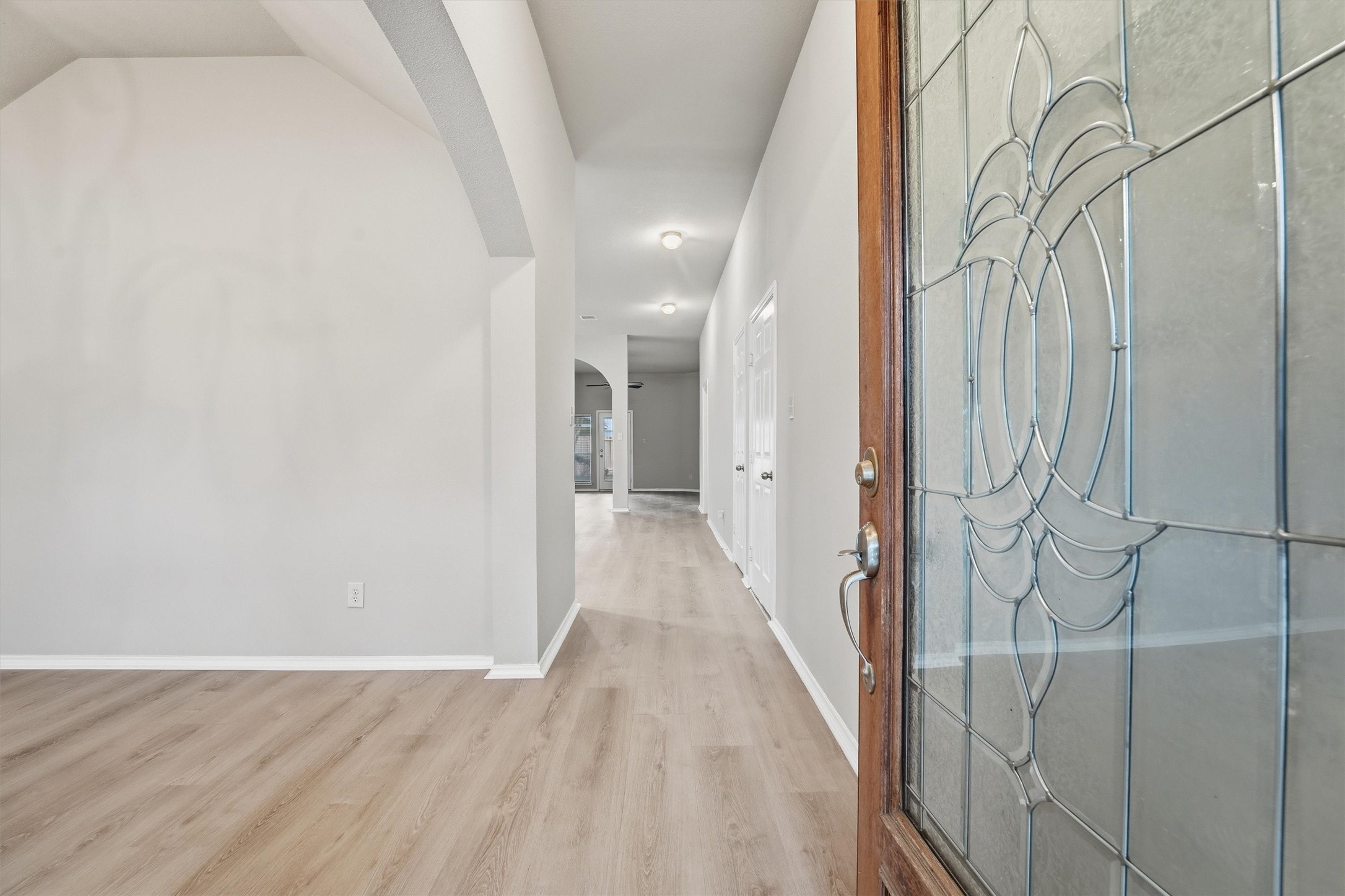 20931 Hamlet Ridge Lane Katy, TX 77449 - Photo 4 of 23 Functional foyer with fresh paint and updated flooring creating a warm first impression.