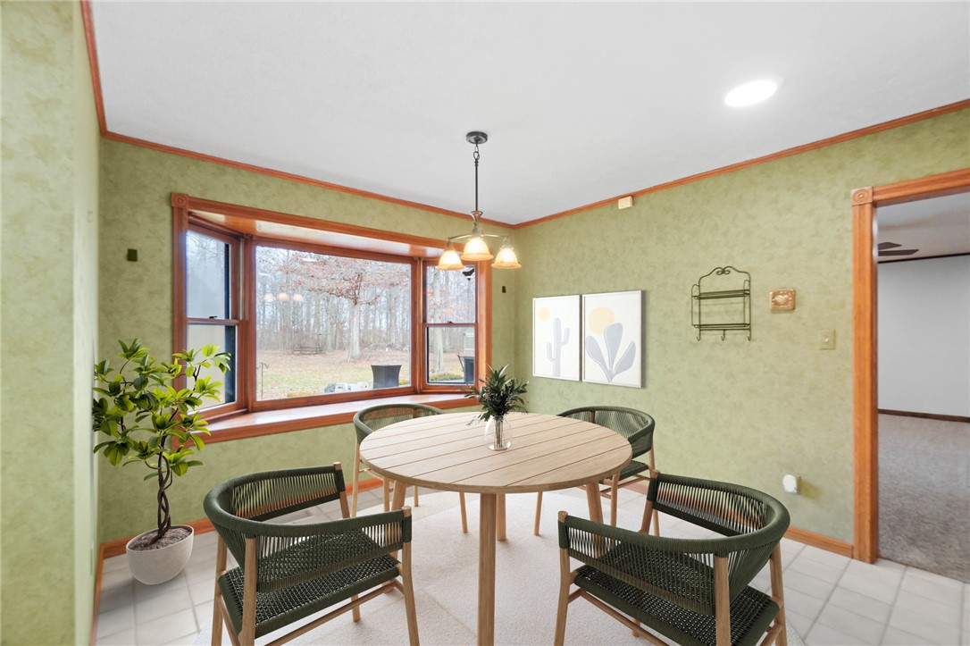 14333 Meranda Road Anna, OH 45302 - Photo 26 of 98 This inviting dining area features a bay window, perfect for enjoying casual meals.