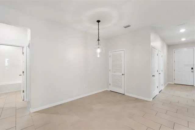 a view of a room with an empty space