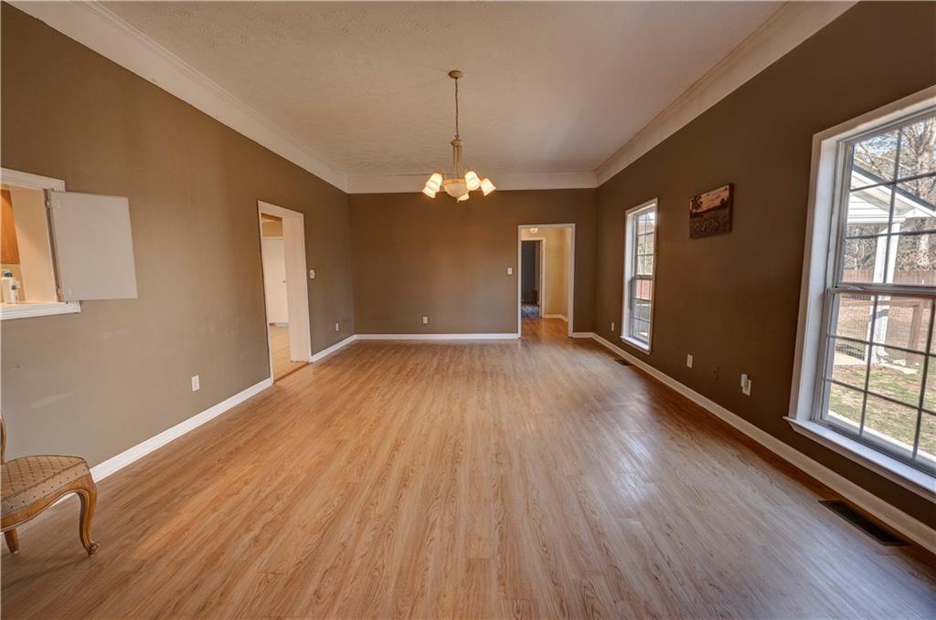 960 McEntyre Loop Calhoun, GA 30701 - Photo 7 of 77 a view of a livingroom with wooden floor
