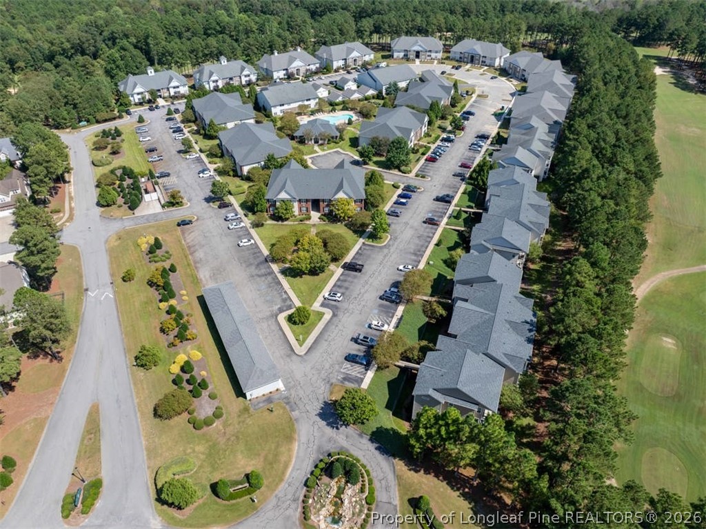 62 Gallery Drive, Unit 102 Spring Lake, NC 28390 - Photo 22 of 23 an aerial view of residential houses with outdoor space