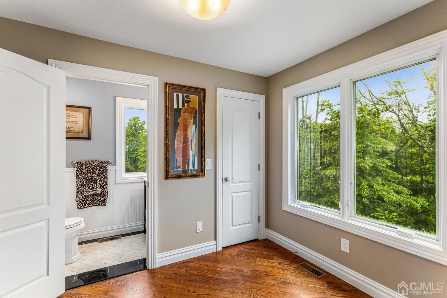 193 Mt Horeb Road Warren, NJ 07059 - Photo 36 of 63 a view of an empty room with wooden floor and a window