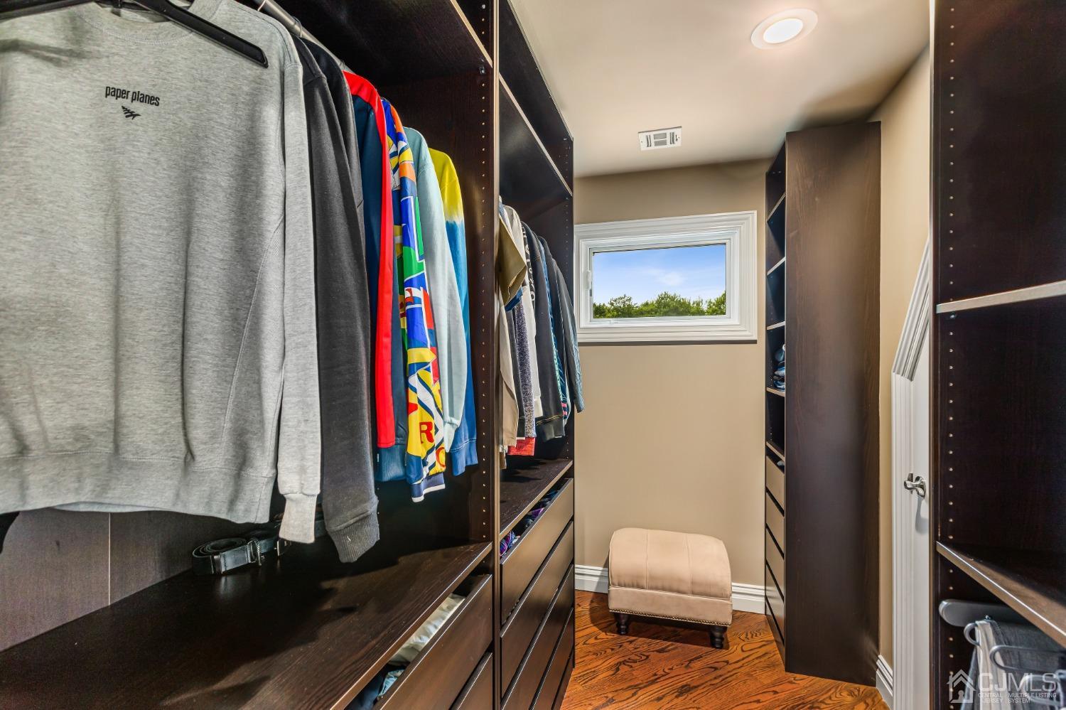 193 Mt Horeb Road Warren, NJ 07059 - Photo 44 of 63 a view of walk in closet with clothes and shoes