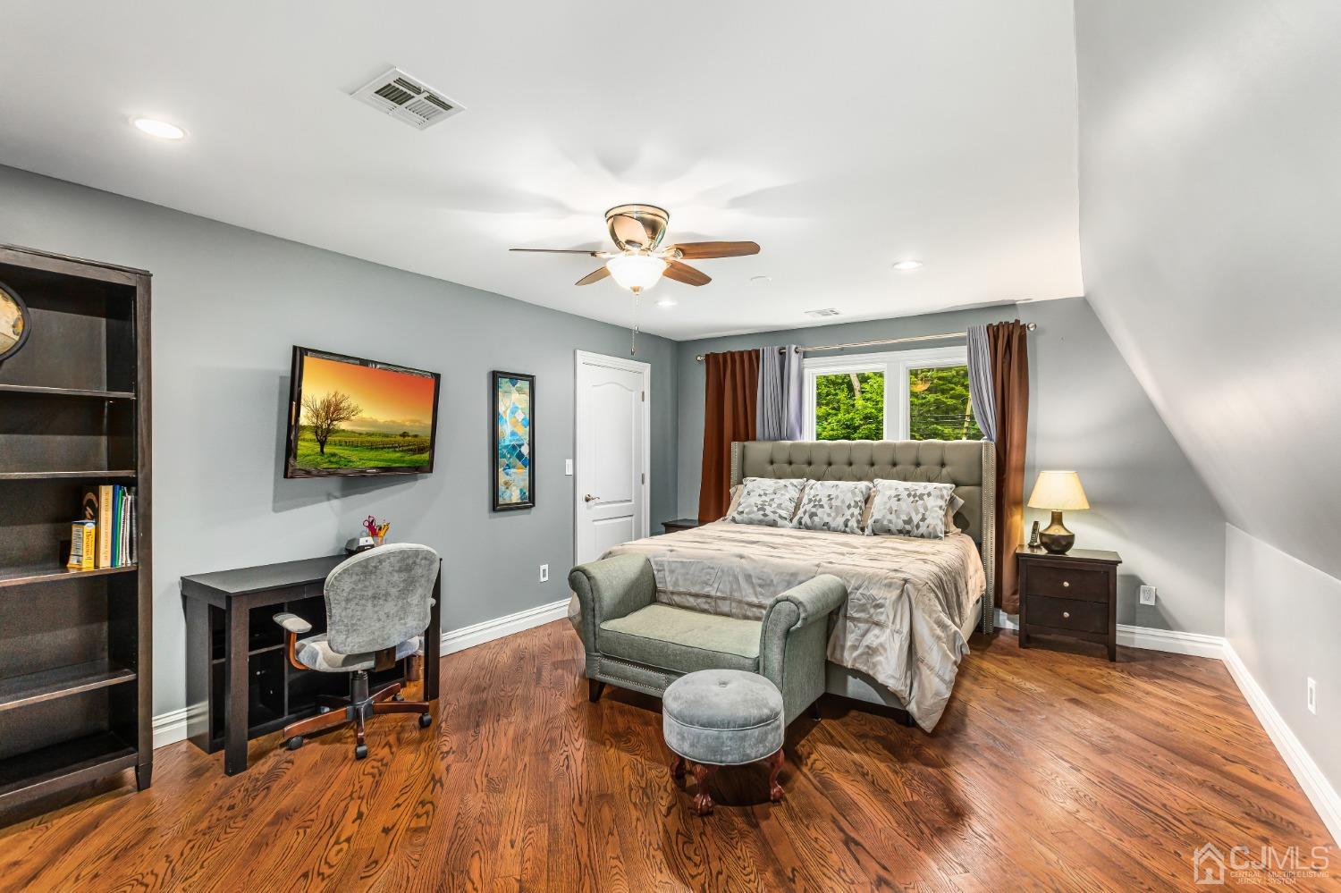 193 Mt Horeb Road Warren, NJ 07059 - Photo 50 of 63 a bedroom with furniture and a flat screen tv
