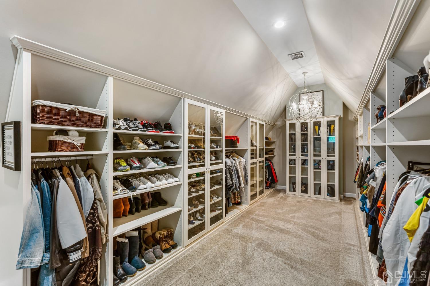 193 Mt Horeb Road Warren, NJ 07059 - Photo 57 of 63 a view of walk in closet with clothes and shoes