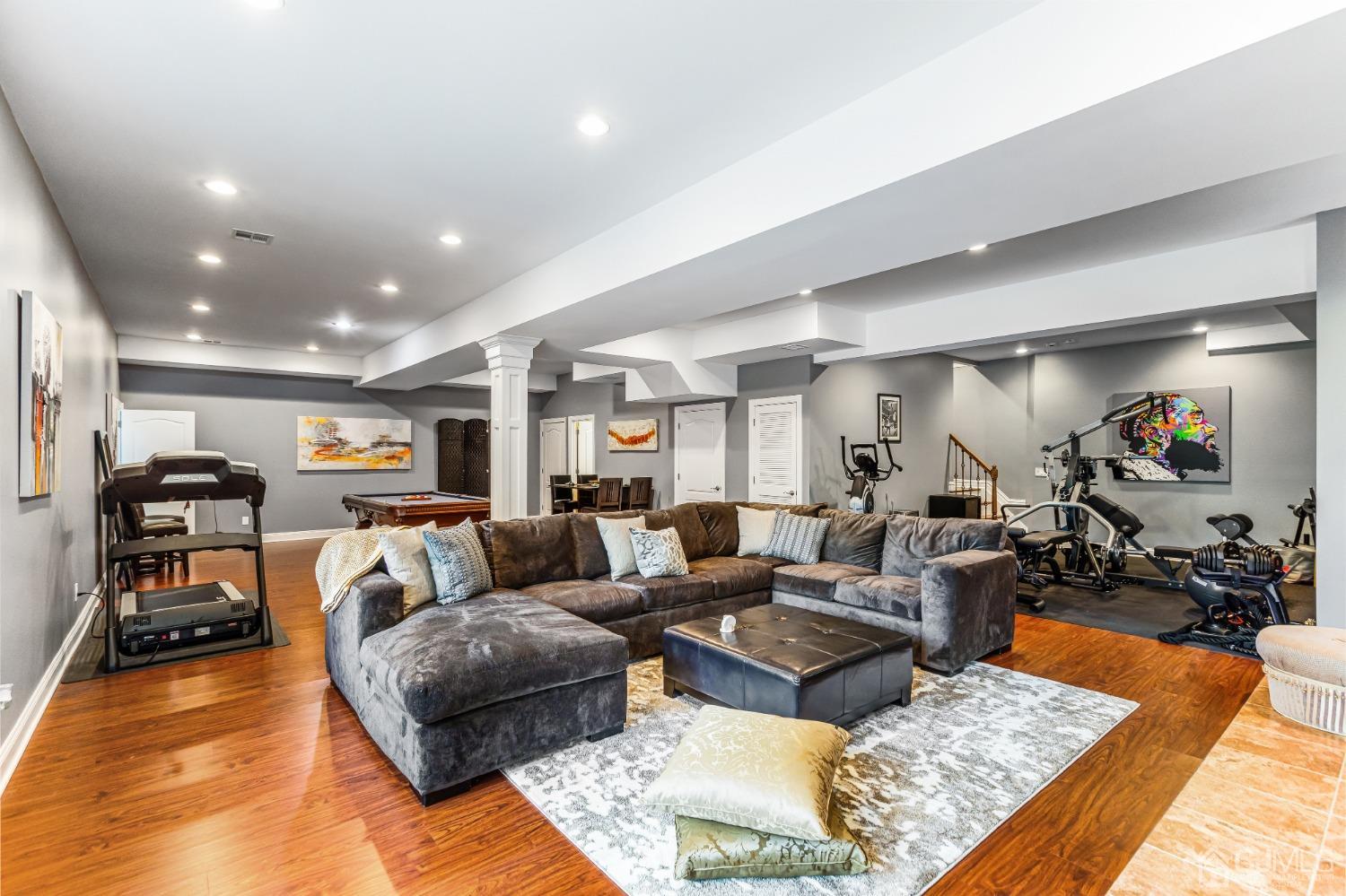 193 Mt Horeb Road Warren, NJ 07059 - Photo 62 of 63 a living room with furniture and wooden floor