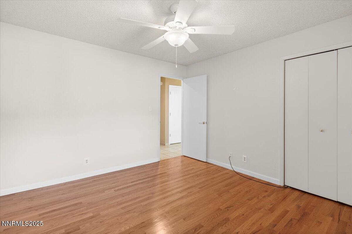 2108 Chicory Way Reno, NV 89509 - Photo 13 of 21 wooden floor in an empty room