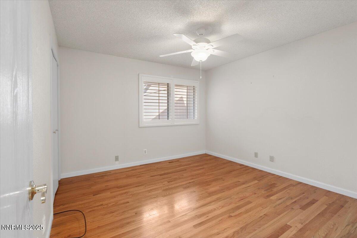 2108 Chicory Way Reno, NV 89509 - Photo 15 of 21 wooden floor in a room with a window