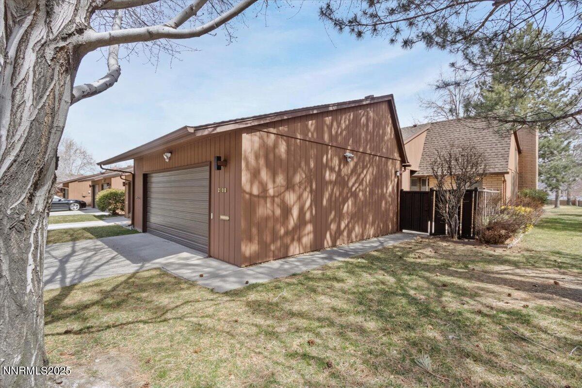 2108 Chicory Way Reno, NV 89509 - Photo 21 of 21 a view of backyard with large trees