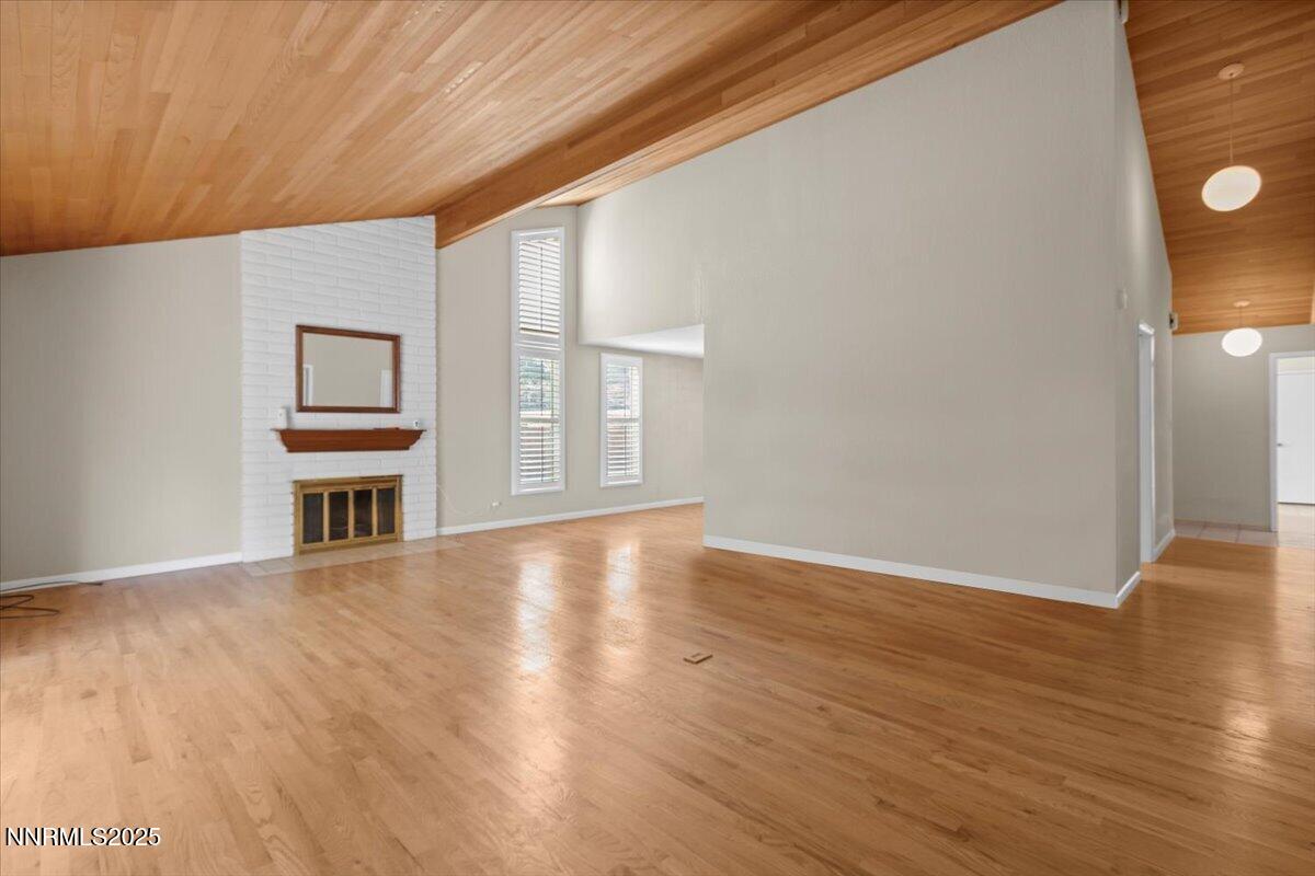 2108 Chicory Way Reno, NV 89509 - Photo 3 of 21 a view of a livingroom with wooden floor and furniture