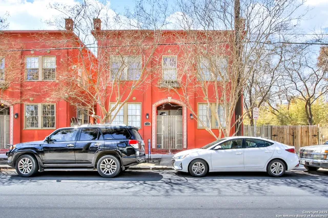 a car parked in front of a house