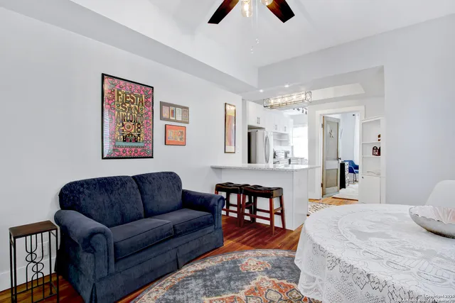 a bed room with furniture and a chandelier