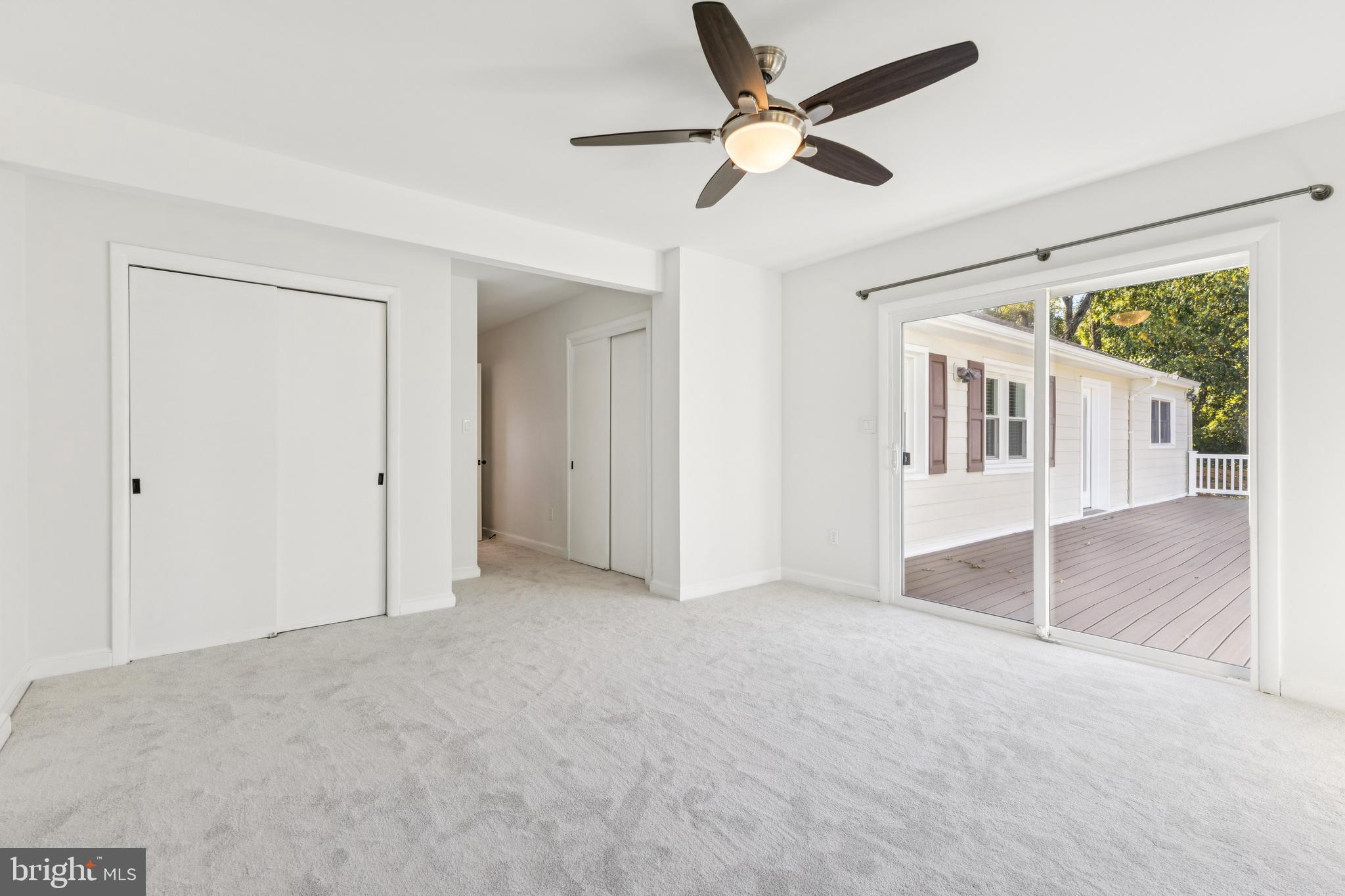 22810 Ridge Road Clarksburg, MD 20871 - Photo 25 of 44 an empty room with ceiling fan and window