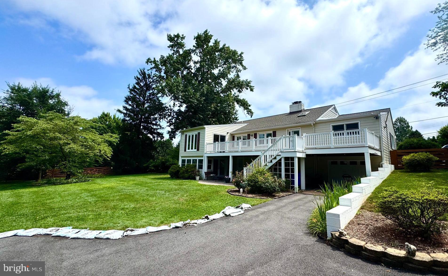 22810 Ridge Road Clarksburg, MD 20871 - Photo 4 of 44 a front view of a house with a yard