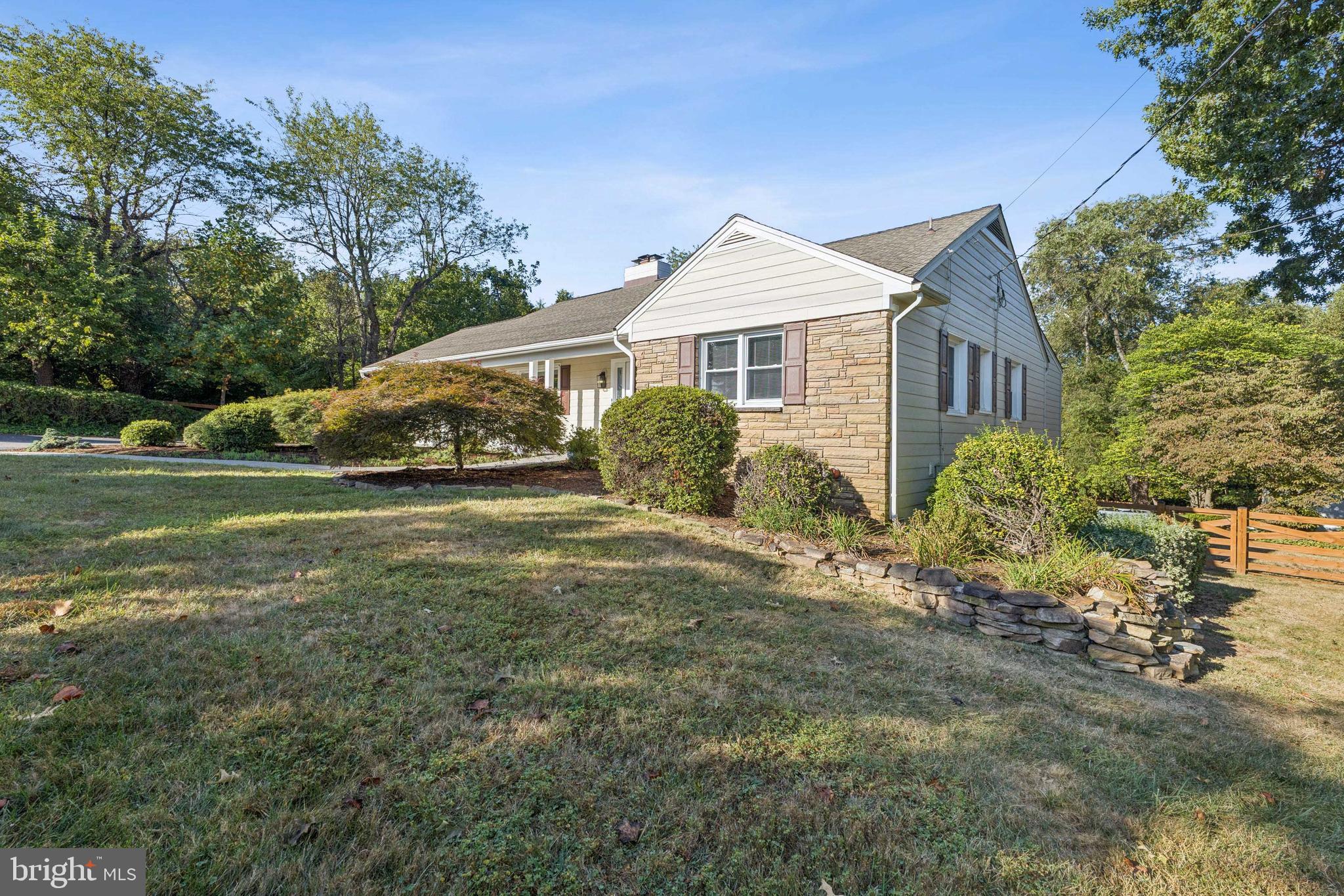 22810 Ridge Road Clarksburg, MD 20871 - Photo 41 of 44 a front view of a house with garden