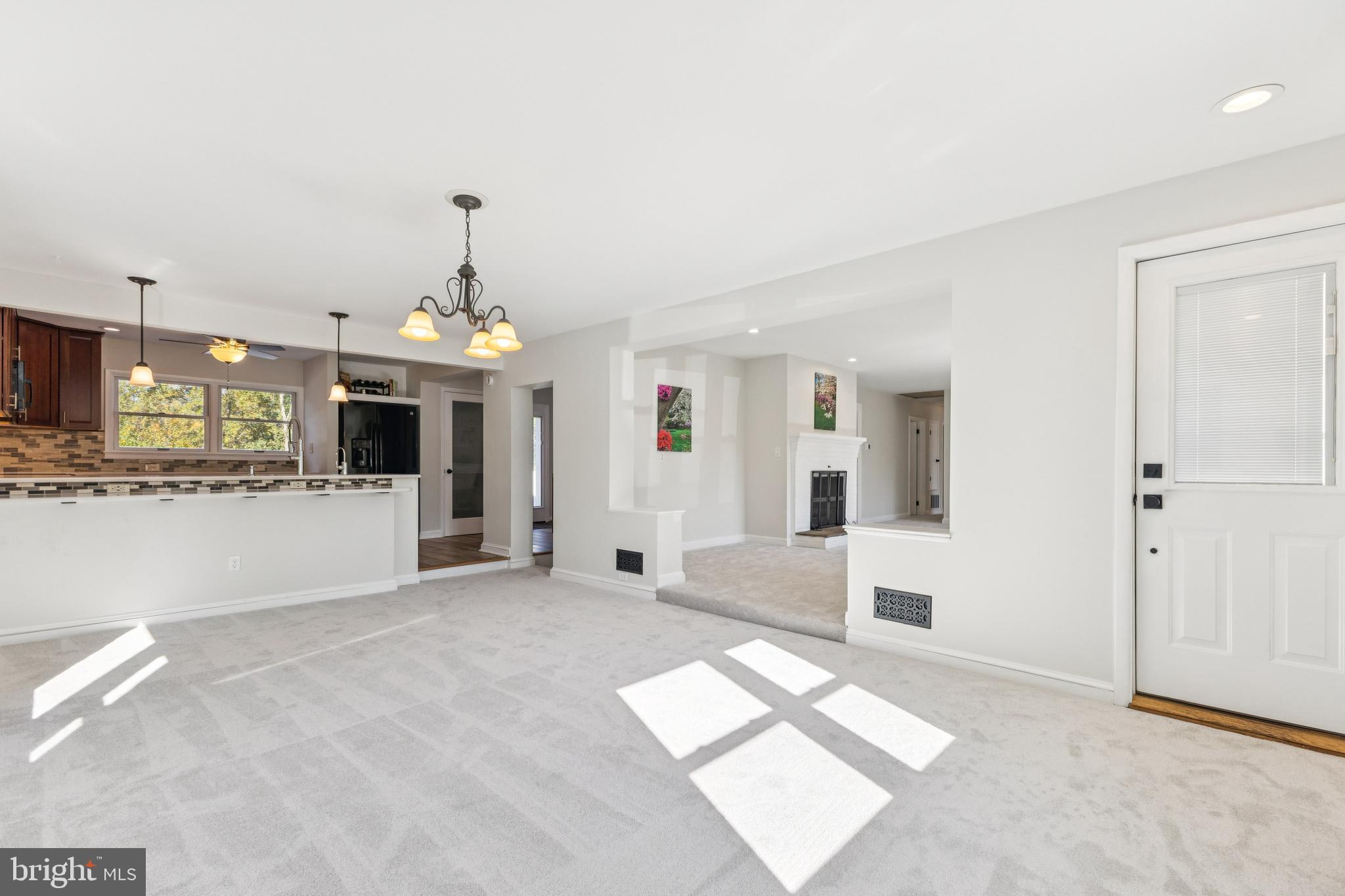 22810 Ridge Road Clarksburg, MD 20871 - Photo 9 of 44 a view of a big room with kitchen view and a window