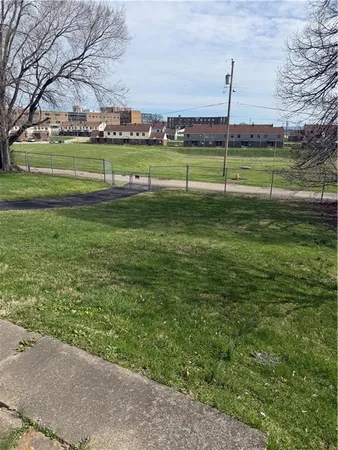 a view of a golf course with a yard