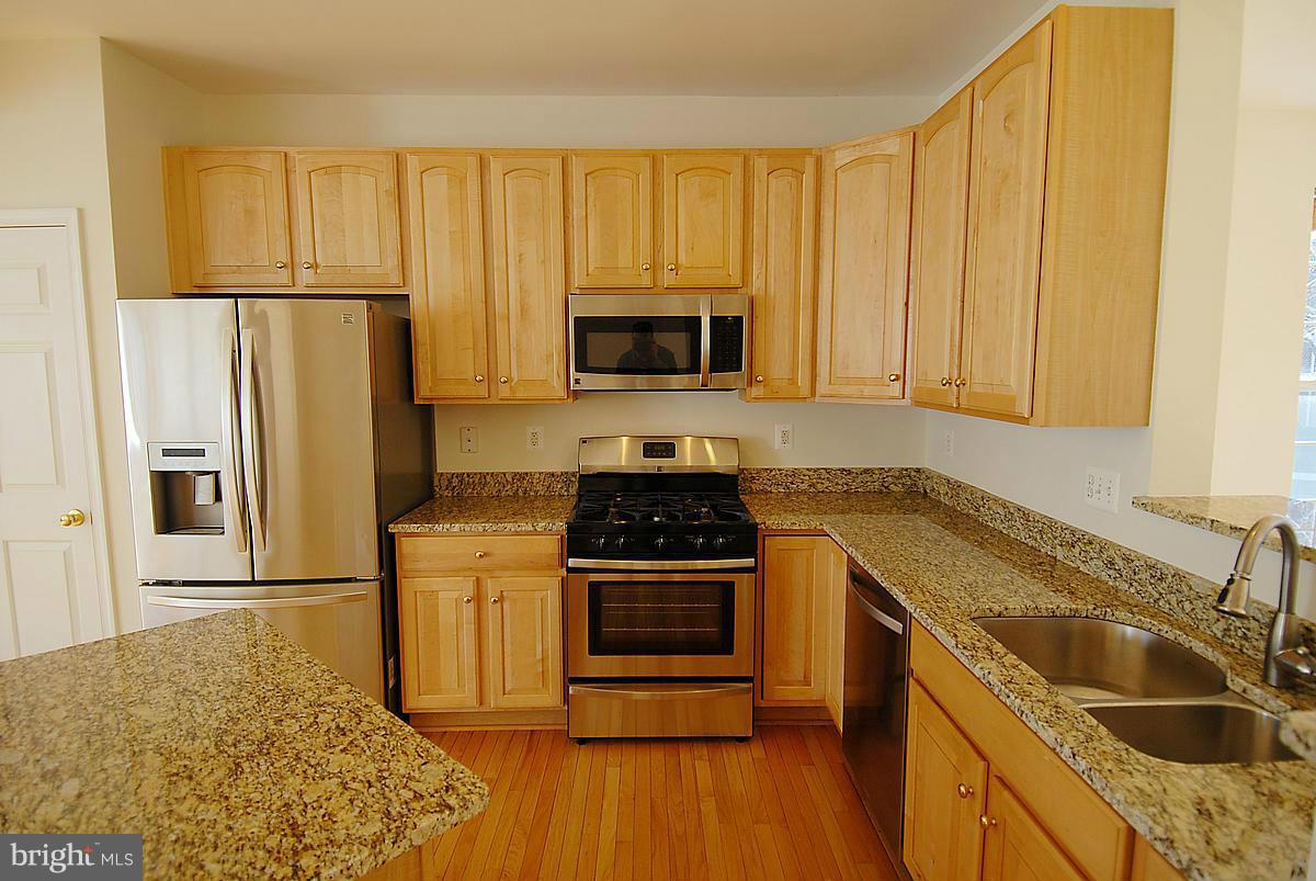 13950 Lullaby Road Germantown, MD 20874 - Photo 7 of 25 Kitchen
