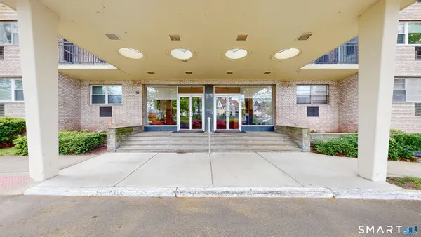 front view of a building with a porch