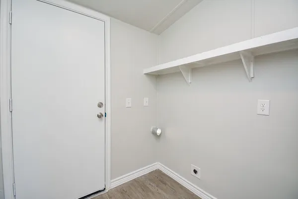 a bathroom with a toilet and a bathtub