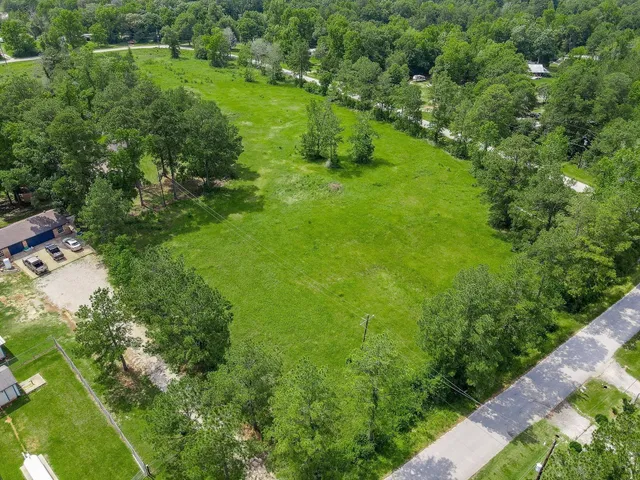 a yard with lots of green space