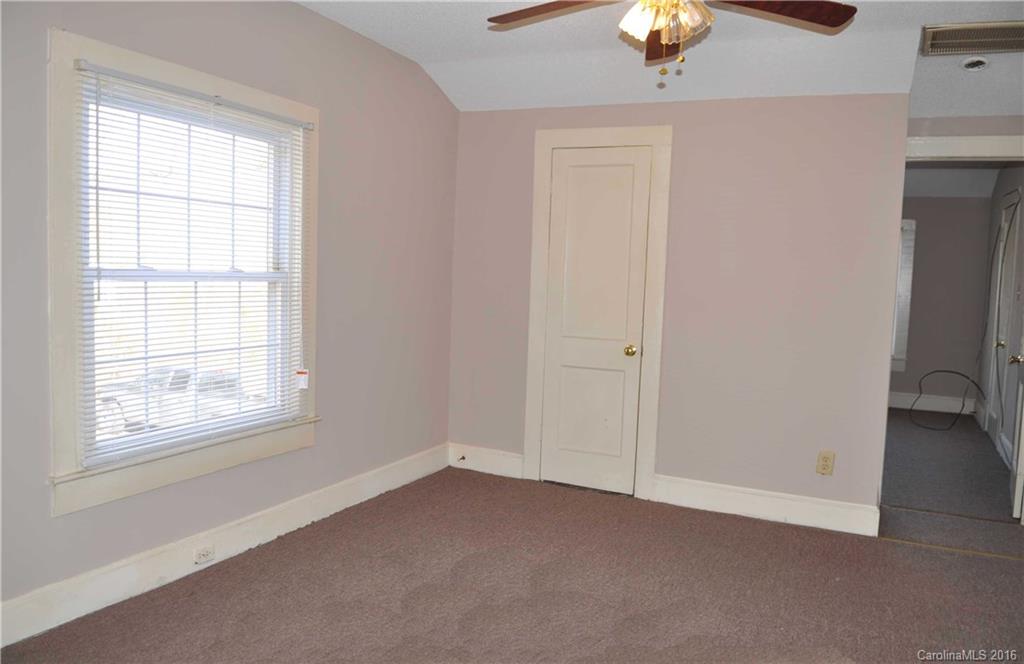 5249 Clearwater Lake Road Mount Holly, NC 28120 - Photo 15 of 16 an empty room with a window