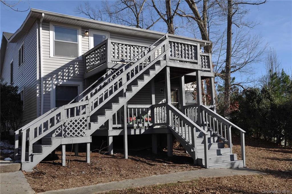 5249 Clearwater Lake Road Mount Holly, NC 28120 - Photo 16 of 16 a view of a house with a deck