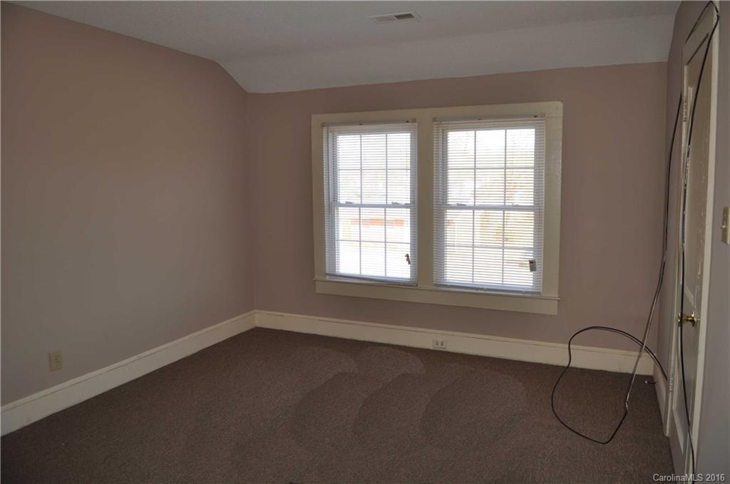 5249 Clearwater Lake Road Mount Holly, NC 28120 - Photo 5 of 16 an empty room with a window