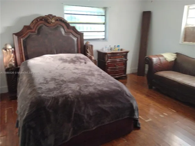 a view of a car parked in front of a house