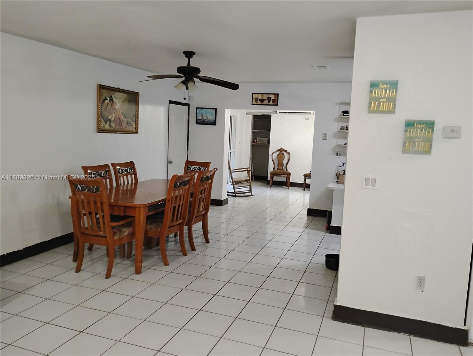 19755 Southwest 190th Street Miami, FL 33187 - Photo 10 of 17 a view of a dining room with furniture