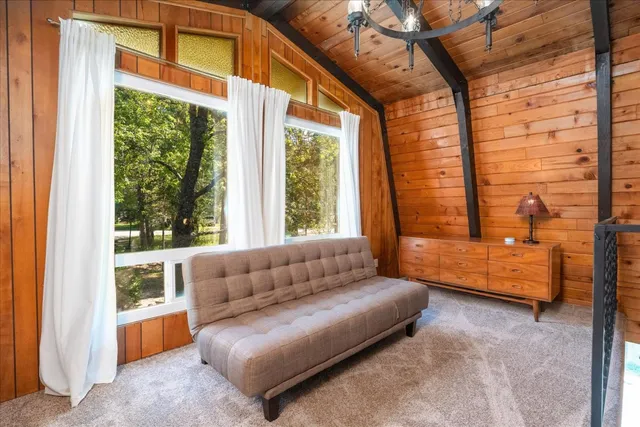 a living room with furniture and a bathtub