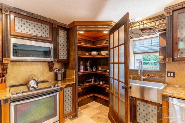a bathroom with a bathtub and a sink