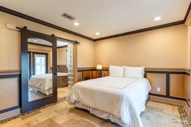 a bathroom with a shower and a sink