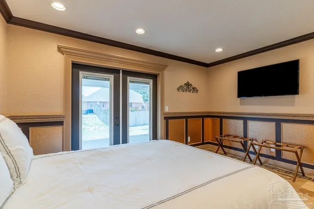 a kitchen with stainless steel appliances kitchen island granite countertop a sink and cabinets