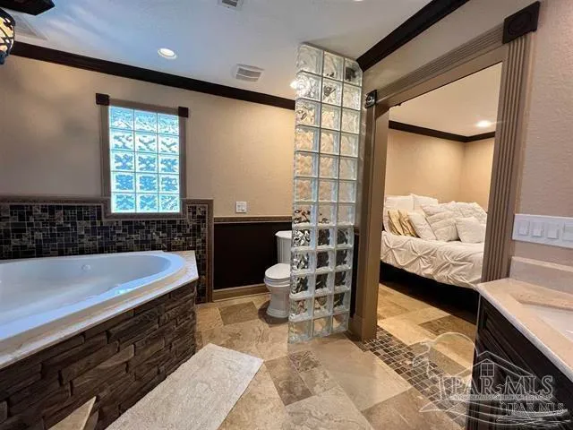 a living room with furniture fireplace and a flat screen tv