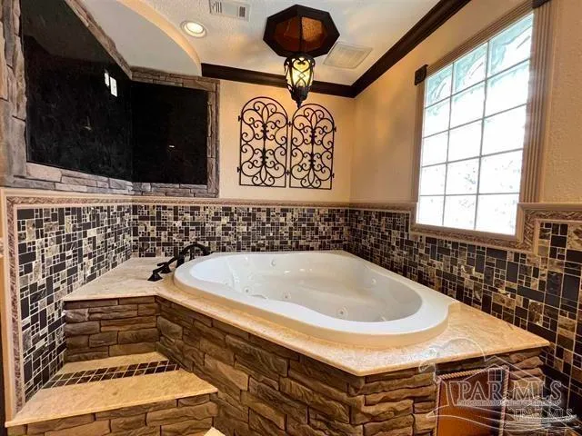 a bathroom with a sink and a bathtub