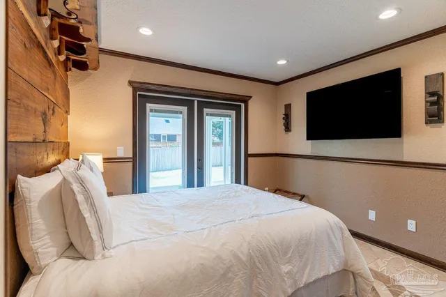 a bathroom with a toilet a sink and a mirror