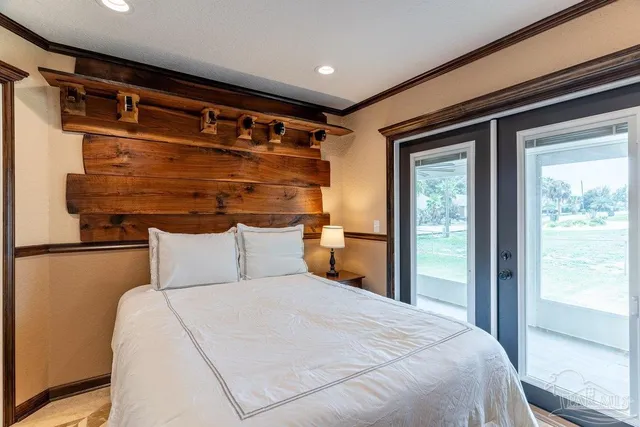 an aerial view of residential building with green space