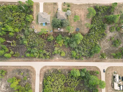 a view of a garden from a balcony